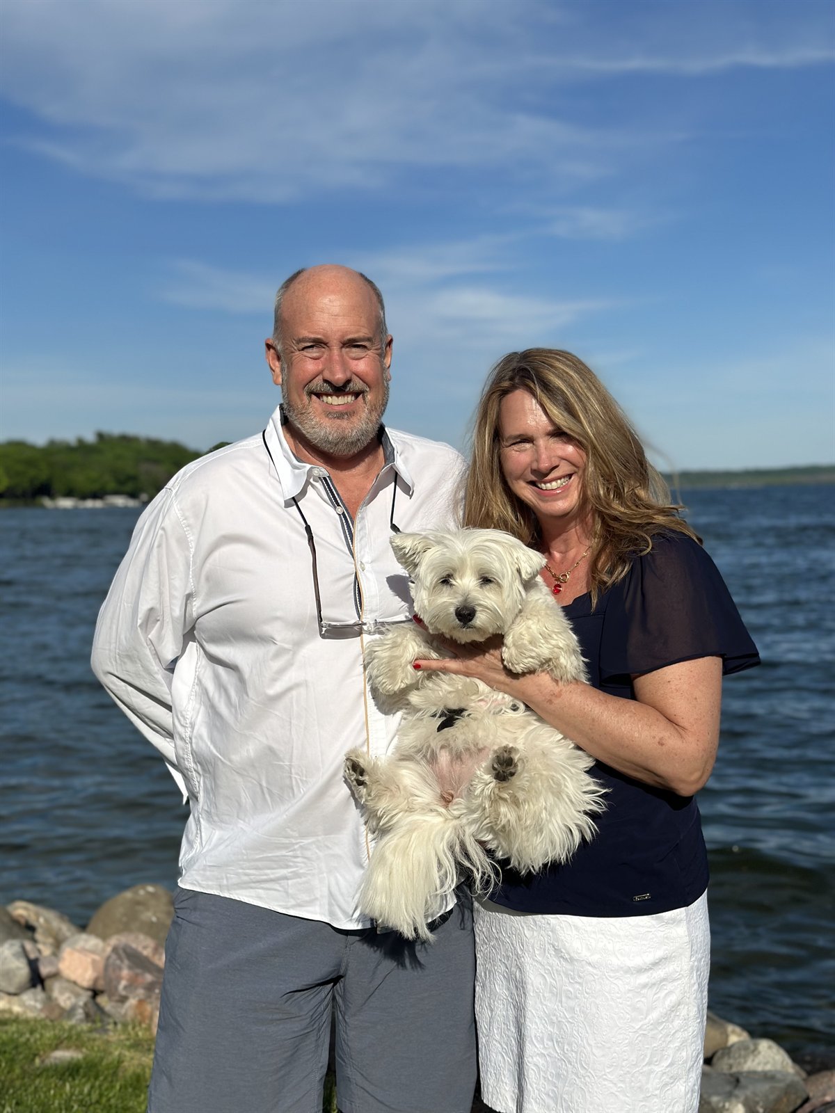 Rebecca and John Van Scyoc, founders of Solara Aevum, on the shore of Green Lake