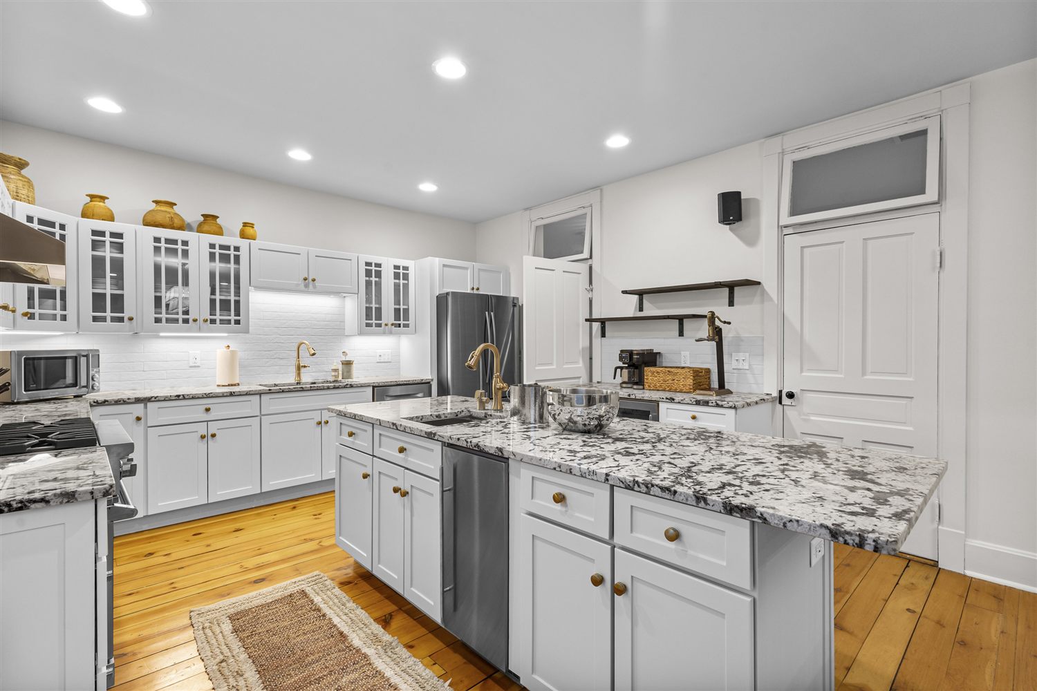 The fully appointed kitchen with granite island at The Stay