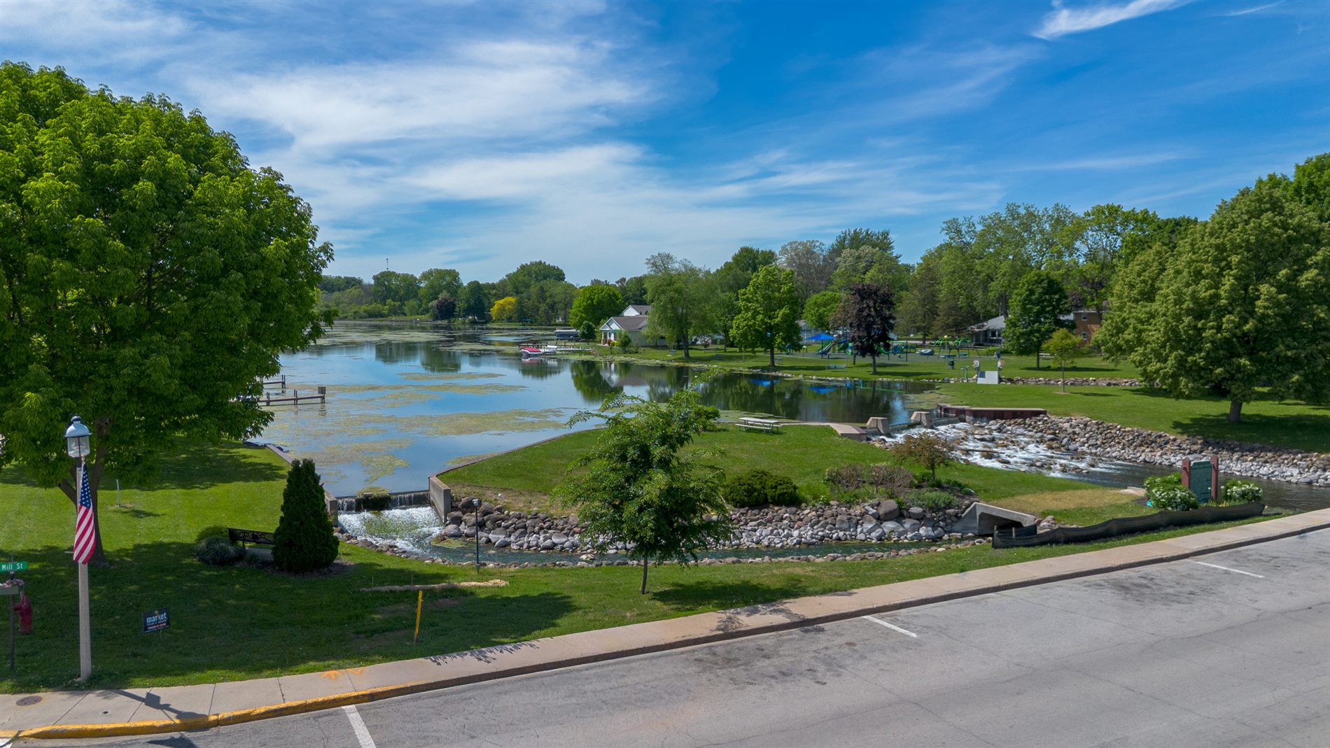 An aerial view over Green Lake, the marina, and downtown near The Stay at Solara