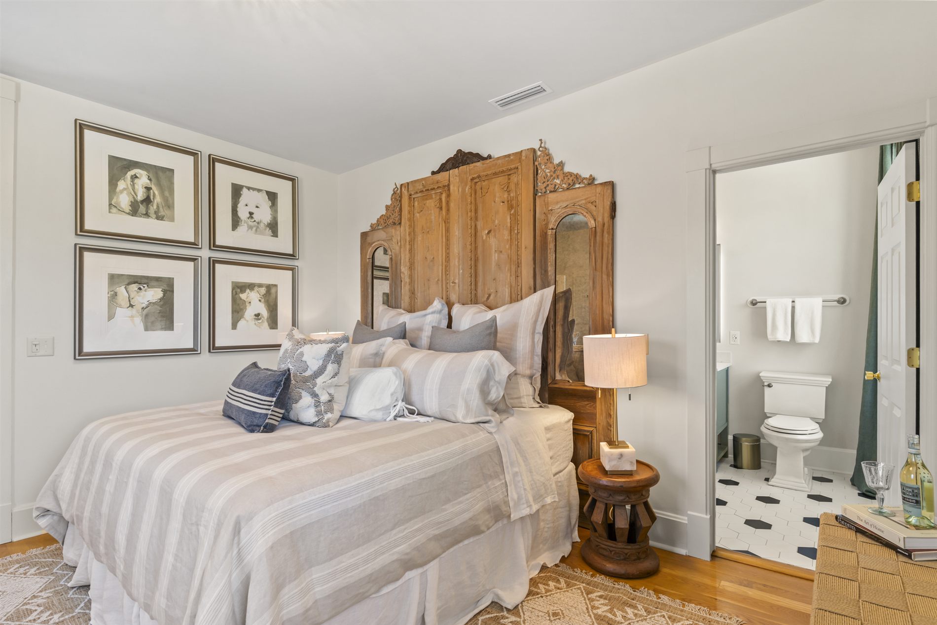 A restful guest bedroom with a curated gallery wall