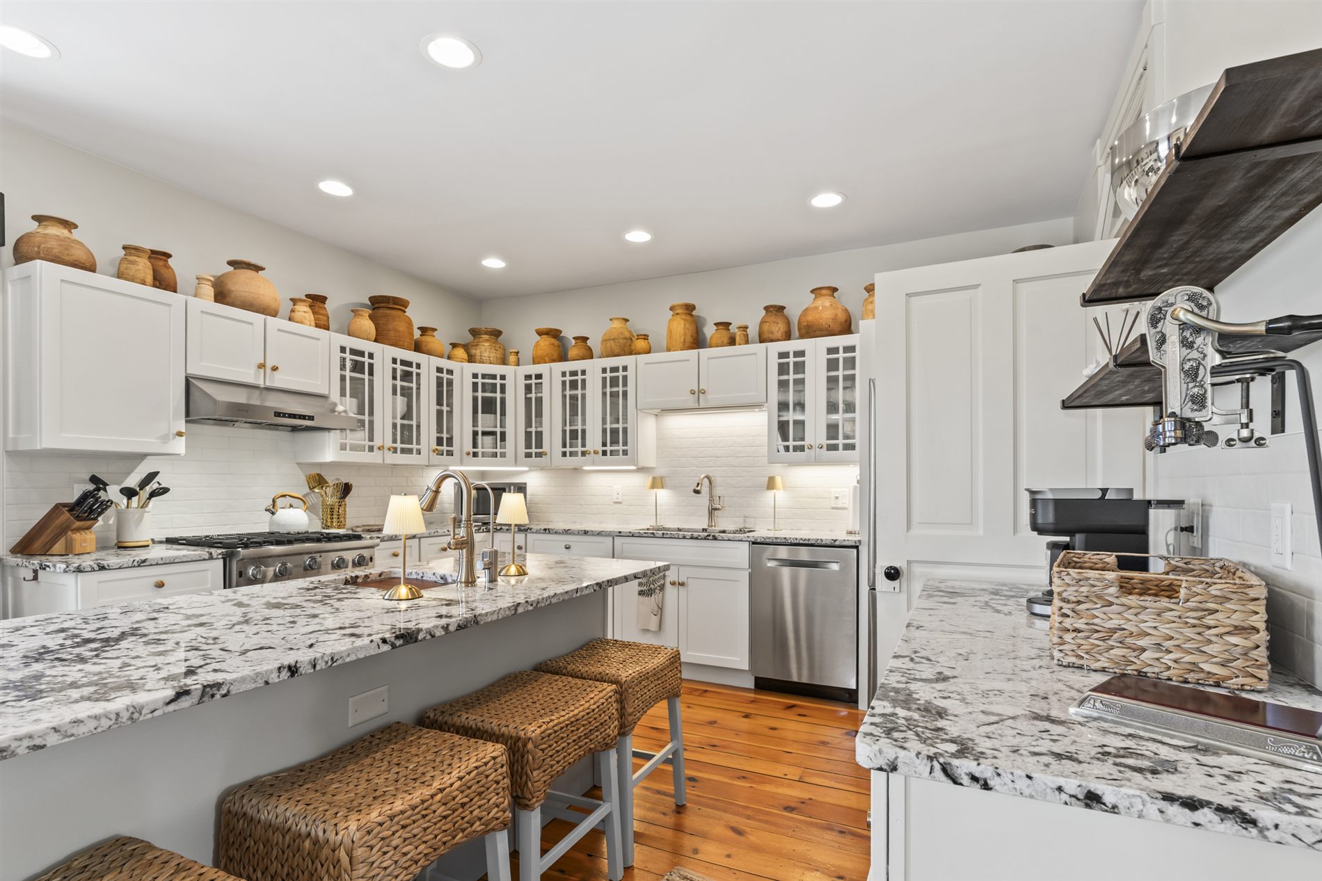 The chef's kitchen at The Stay, with a marble island and professional-grade appliances